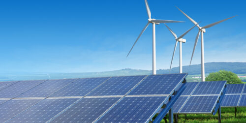 solar panels and wind turbines under blue sky solar panels and wind turbines under blue sky on summer landscape